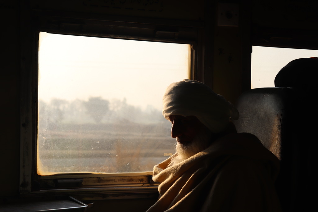 Pakistaner im Zug